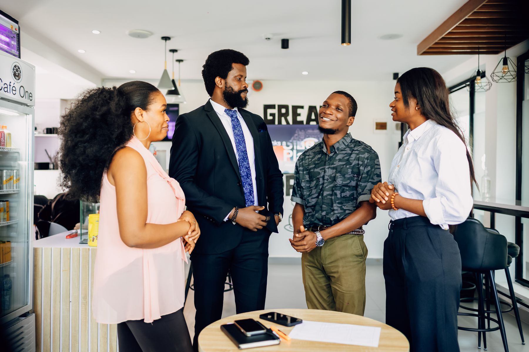 A small group meeting around a table